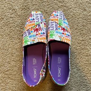 Brand new Unity Toms size 8